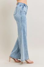 Plus size wide-leg jeans in light wash denim, side seam detail, long flared leg