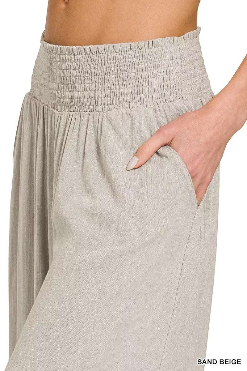 Sand beige smocked waistband wide-leg pants with side pocket opening