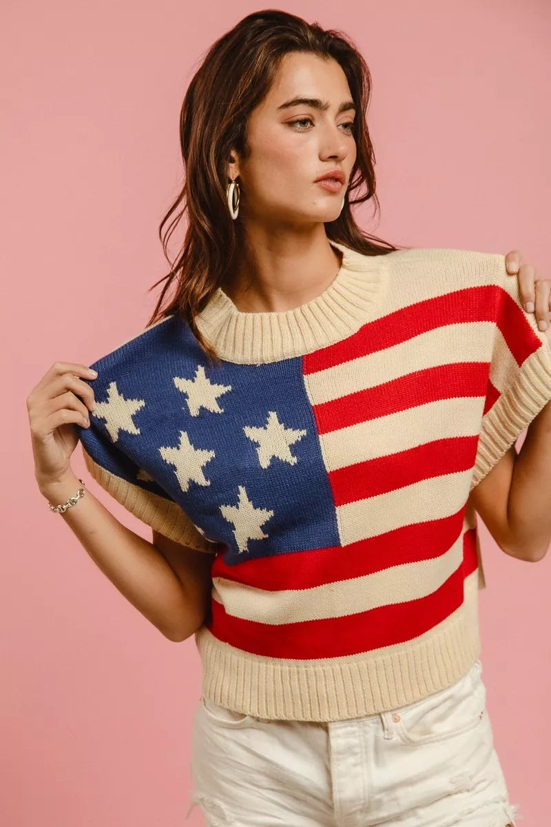 American flag knit sweater with blue star patch and red-white stripes, ribbed crew neck