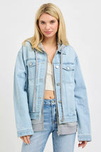 Oversized hooded light-wash denim jacket with buttoned front and chest flap pockets