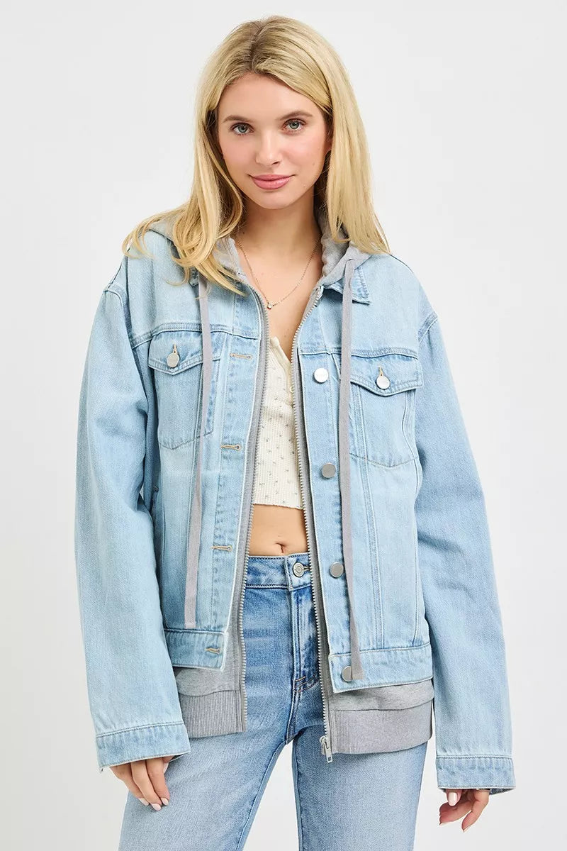 Oversized hooded light-wash denim jacket with buttoned front and chest flap pockets