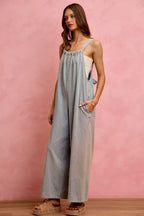 Light blue denim wide-leg overalls with square neckline and chest yoke stitching
