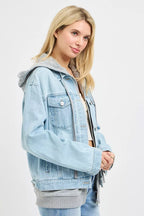 Oversized hooded light-wash denim jacket with button flap chest pockets and drawstring