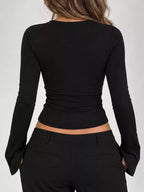 Black lace-trim V-neck long-sleeve tee, back view with ruched waist seam.
