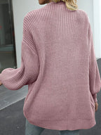 Chunky knit lantern sleeve cardigan in dusty rose, back view, textured chunky knit.
