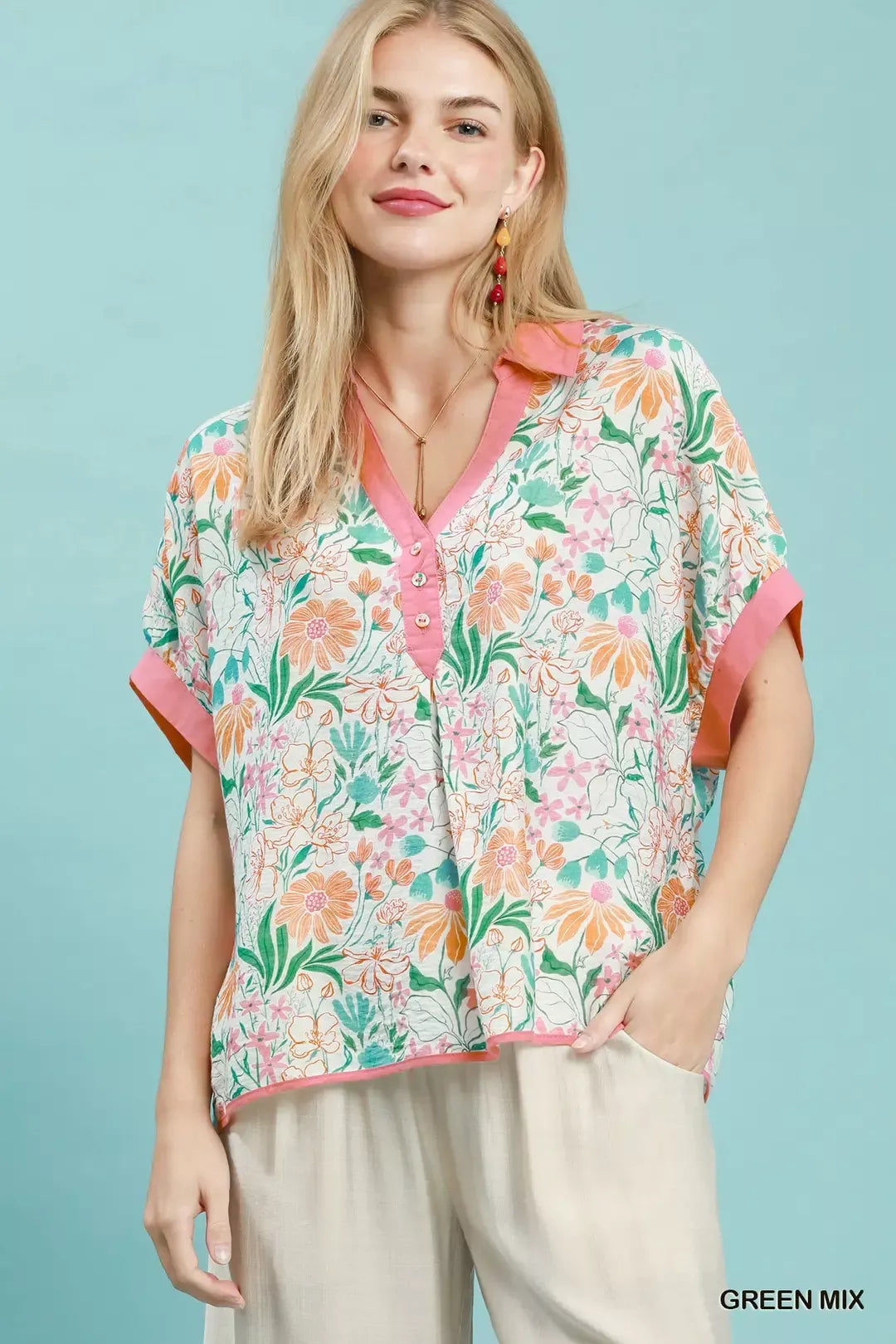 Floral v-neck oversized blouse with pink button-front and short sleeves