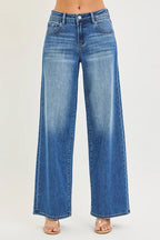 Women's medium-wash wide-leg denim jeans with relaxed fit, front pockets, button fly