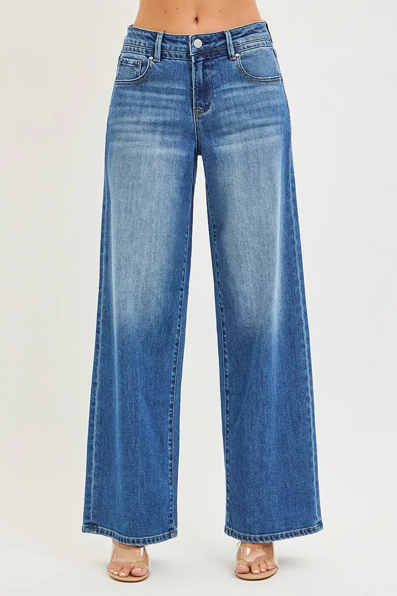 Women's medium-wash wide-leg denim jeans with relaxed fit, front pockets, button fly