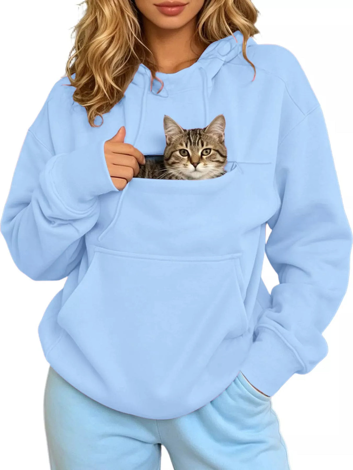 Light blue cat pouch drawstring hoodie with cat face in front pouch, worn front view