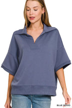 Blue indigo polo collar short-sleeve pullover with V placket and relaxed fit
