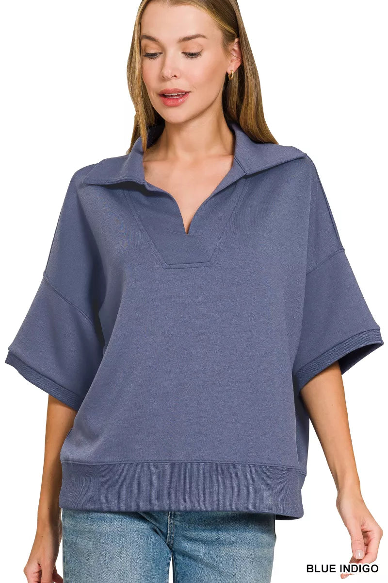 Blue indigo polo collar short-sleeve pullover with V placket and relaxed fit