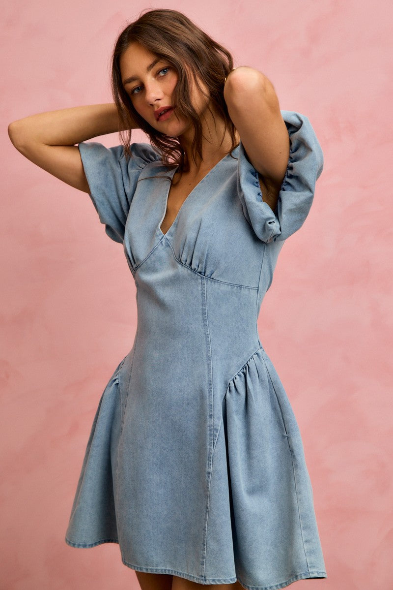 Light denim V-neck mini dress with bubble sleeves and gathered waist flare