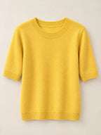 Yellow round-neck short-sleeve knit sweater with ribbed neckline and cuffs