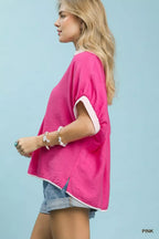 Pink oversized top with contrast stripe-trimmed sleeves and V-neck button placket, side