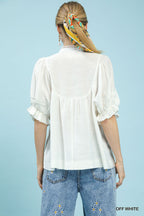 Off-white blouse back view with short puff sleeves and gathered yoke, womens top