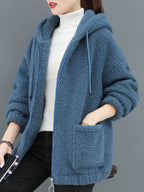 Blue fleece zip-up hoodie with hood, zipper front, and front pouch pockets