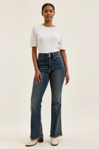 High-waist straight dark blue jeans with frayed hem and button-fly closure