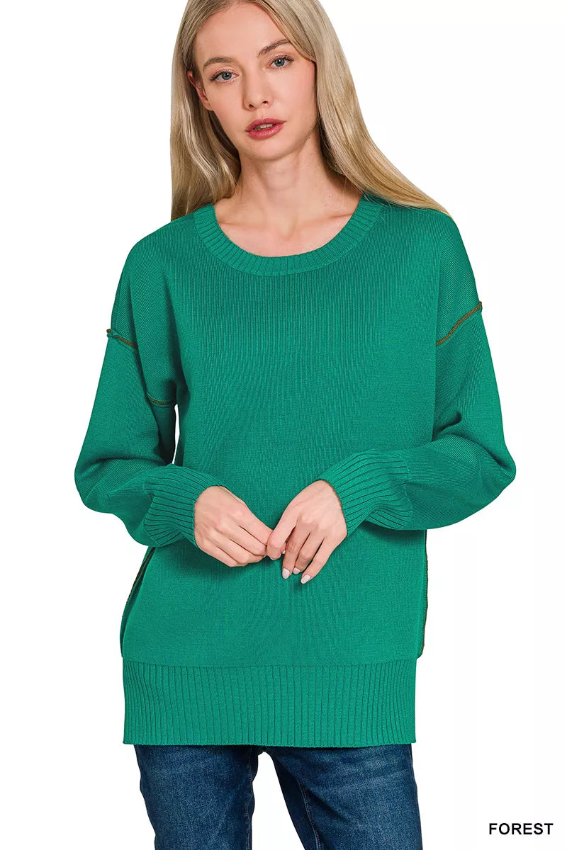 Forest green contrast-trim round-neck knit top, long sleeves and ribbed hem