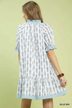 Light blue floral-print tiered mini dress back view with ruffle sleeves and gathered yoke