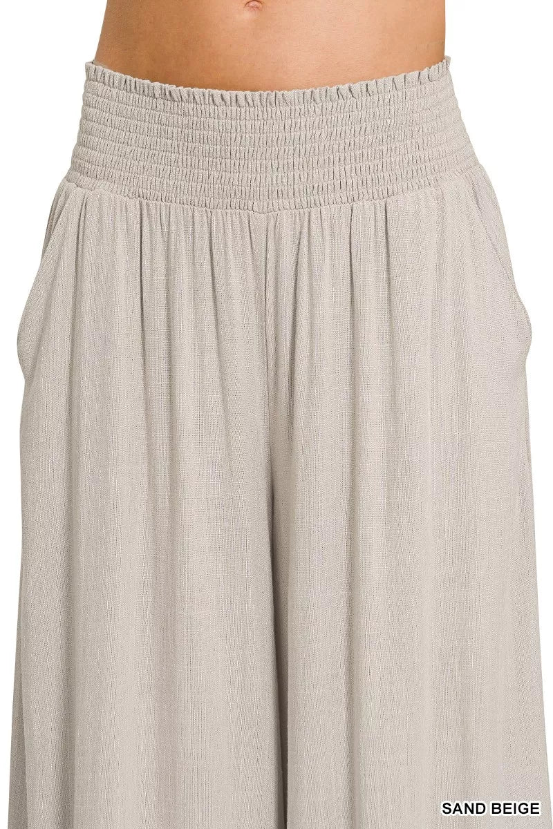 Sand beige wide-leg lounge pants with smocked elastic waistband, relaxed fit