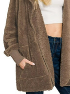 Hooded Faux Fur Jacket with Pockets – Cozy & Stylish Winter Outerwear