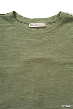 Light olive slub knit crew neck T-shirt with ribbed neckline and collar label