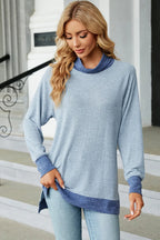 Light blue long-sleeve mock-neck slit tee with contrast hem band, front view