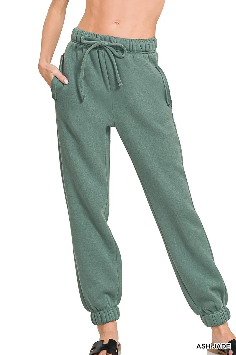 Ash jade fleece joggers with drawstring, pockets, elastic waistband, cuffed ankles