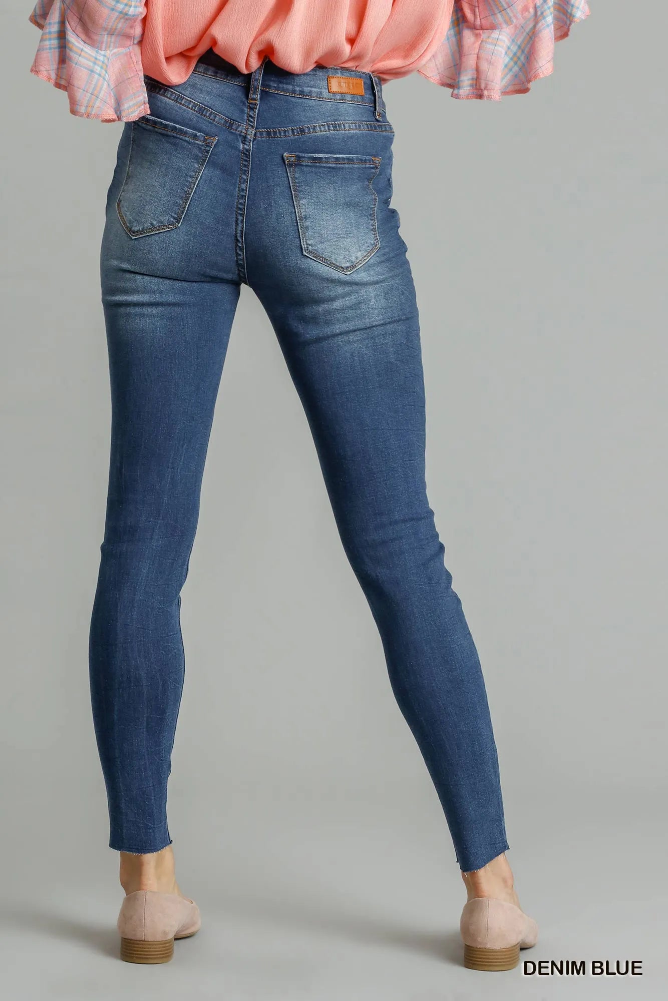 High-Waisted Distressed Skinny Jeans – Medium Blue Stretch Denim