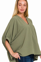 Sage Green V-Neck Blouse with Rolled Sleeves & Asymmetrical Hem