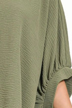 Sage Green V-Neck Blouse with Rolled Sleeves & Asymmetrical Hem