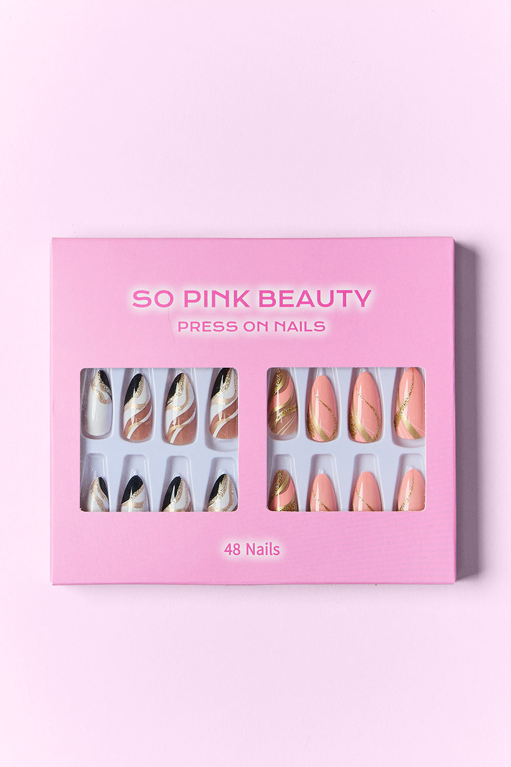SO PINK BEAUTY press-on nails 2-pack box showing marbled black-and-gold nail tips