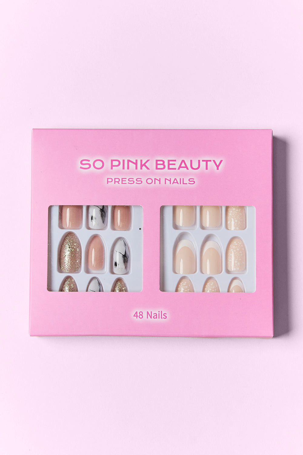 Press-on nails box with nude, rose, and glitter oval nail sets, 48 nails