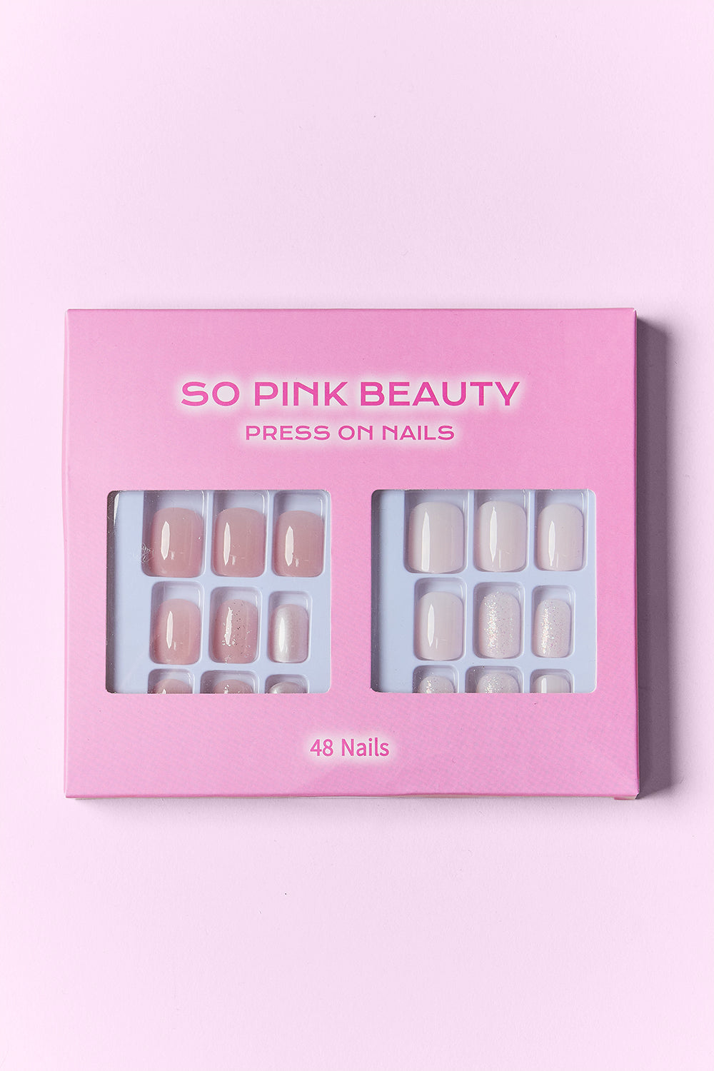 Press-on nail kit box with nude and white half-moon designs, 48 nails