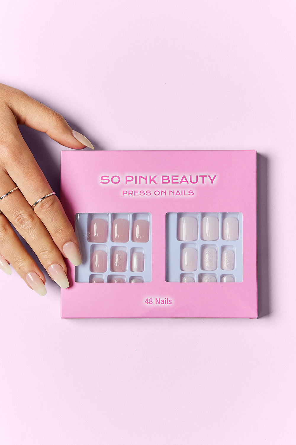 Press-on nail set box with clear and nude nails with white tips, 48 nails