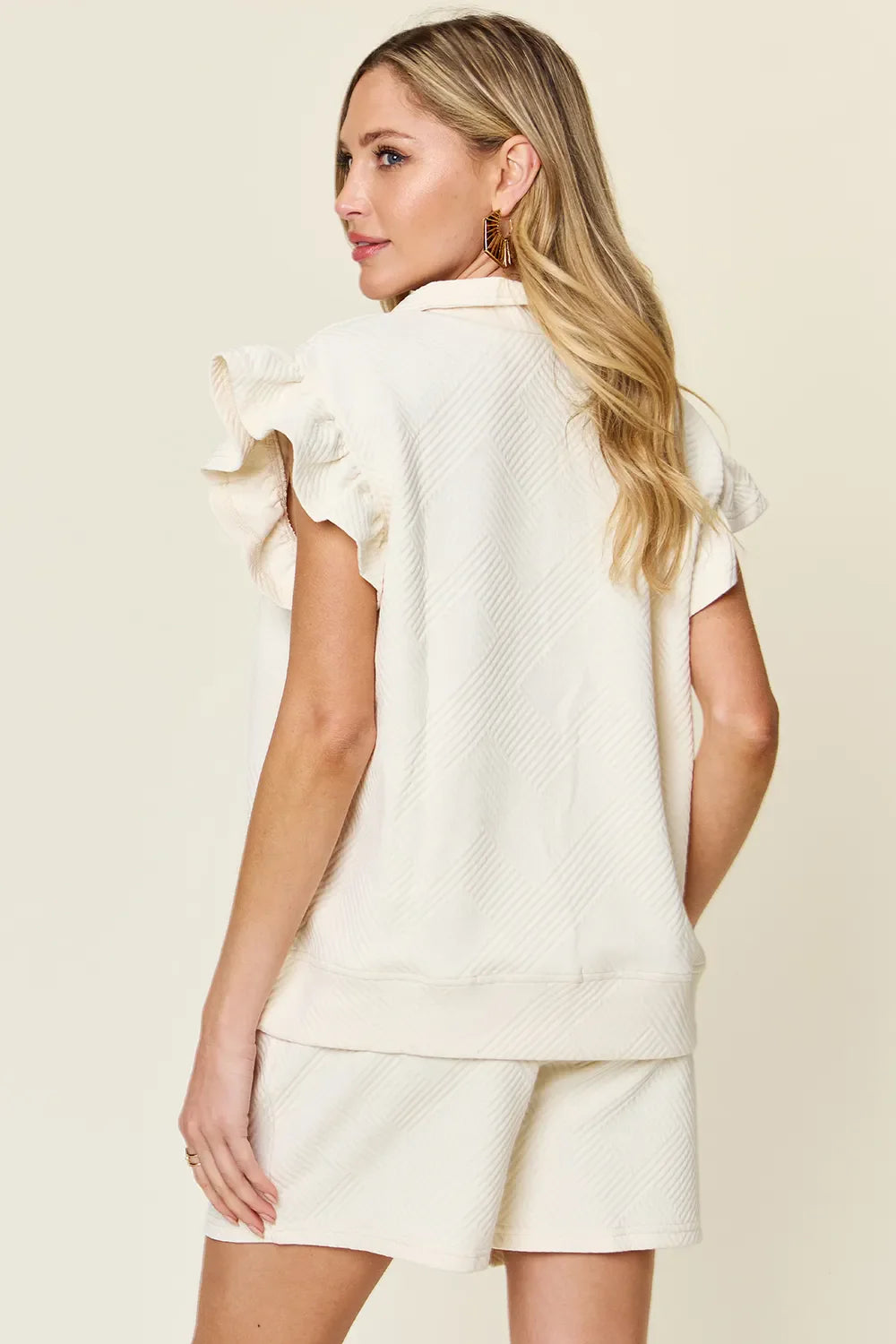 Two-piece textured top and drawstring shorts set, light blue, side view with ruffled sleeves
